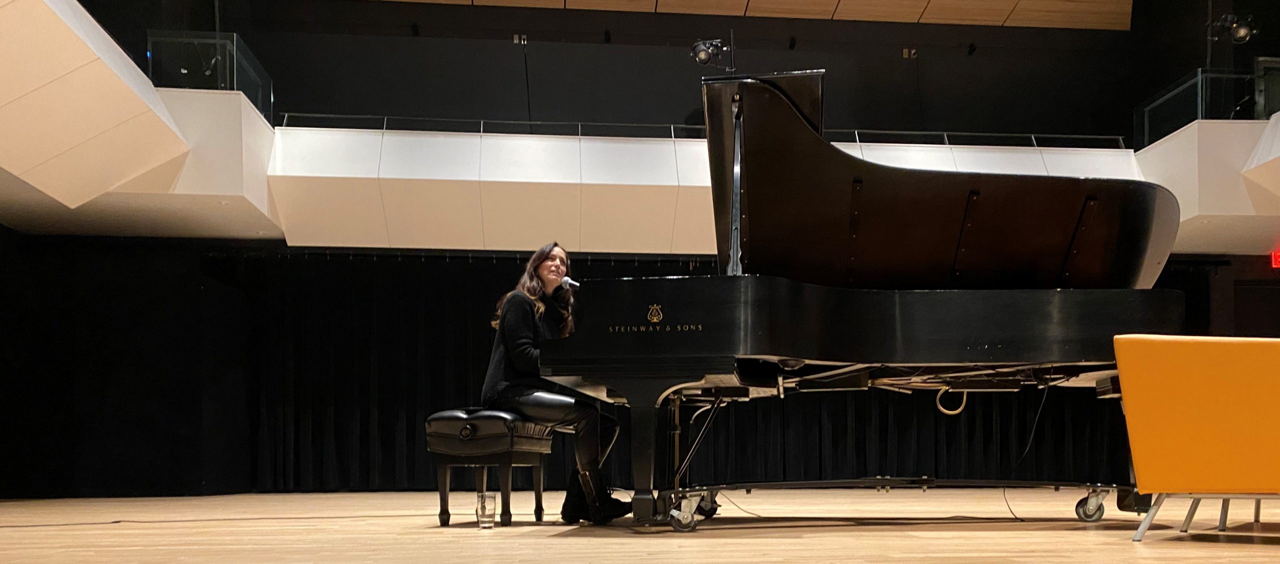 Chantal Kreviazuk on stage at piano
