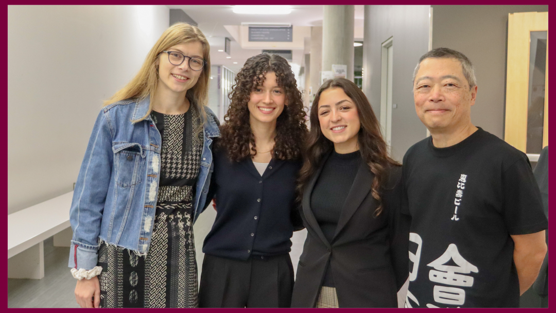 Tthree students standing with a grad, Bruce Miyashita (Artsci 1984)